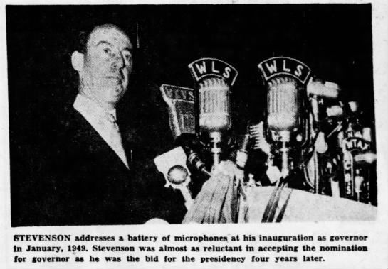 Stevenson addresses a battery of microphones